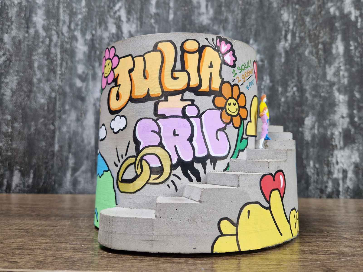 Statement Graffiti Planter Engagement Gift displayed alongside complementary pieces