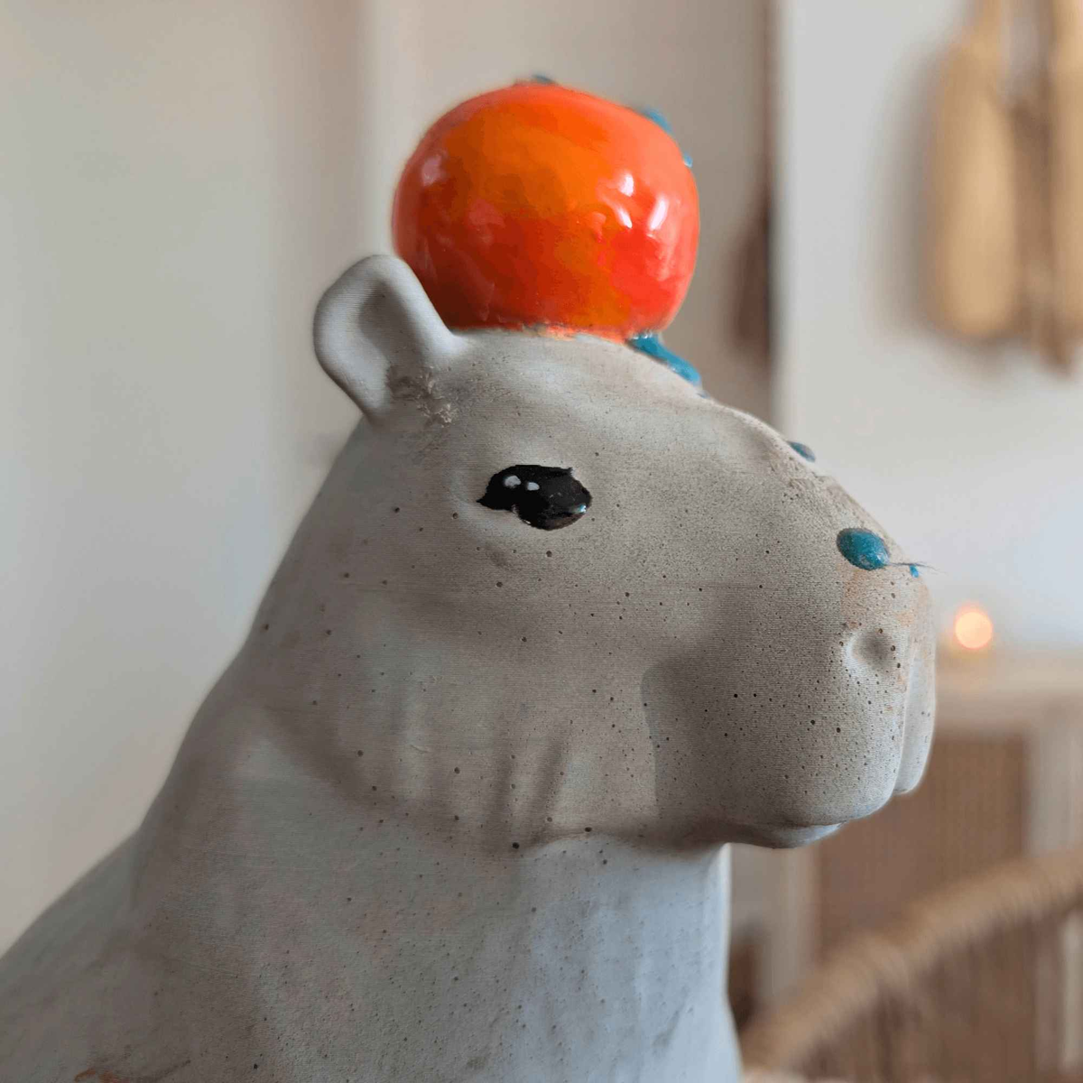 Capybara with Orange Concrete Sculpture