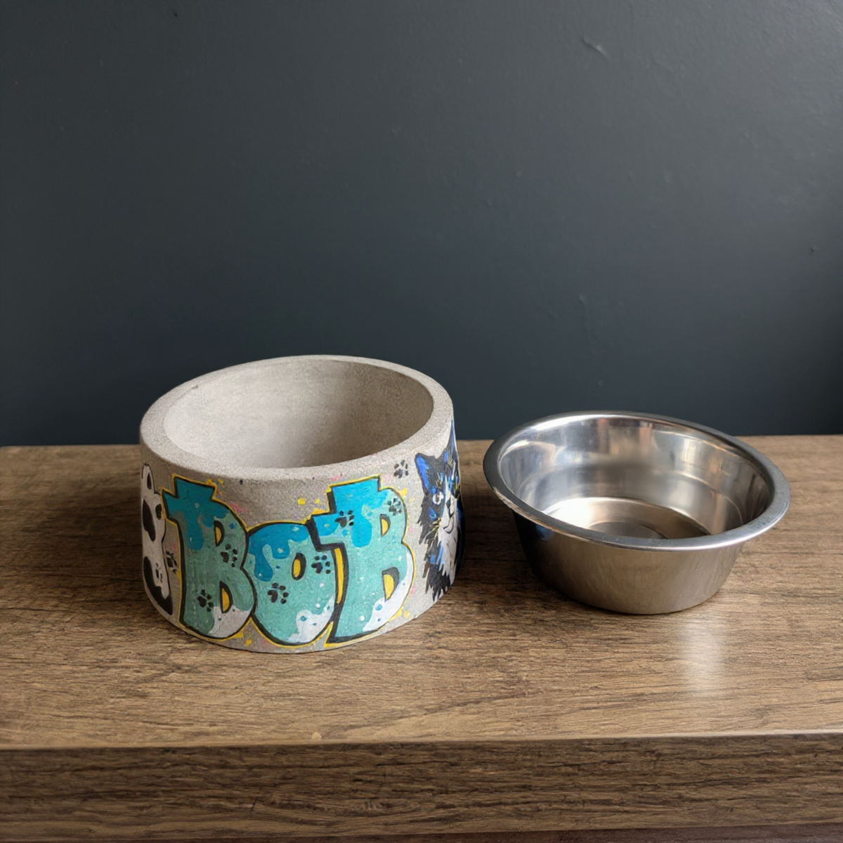 Personalized Graffiti Pet Bowl displayed alongside complementary pieces