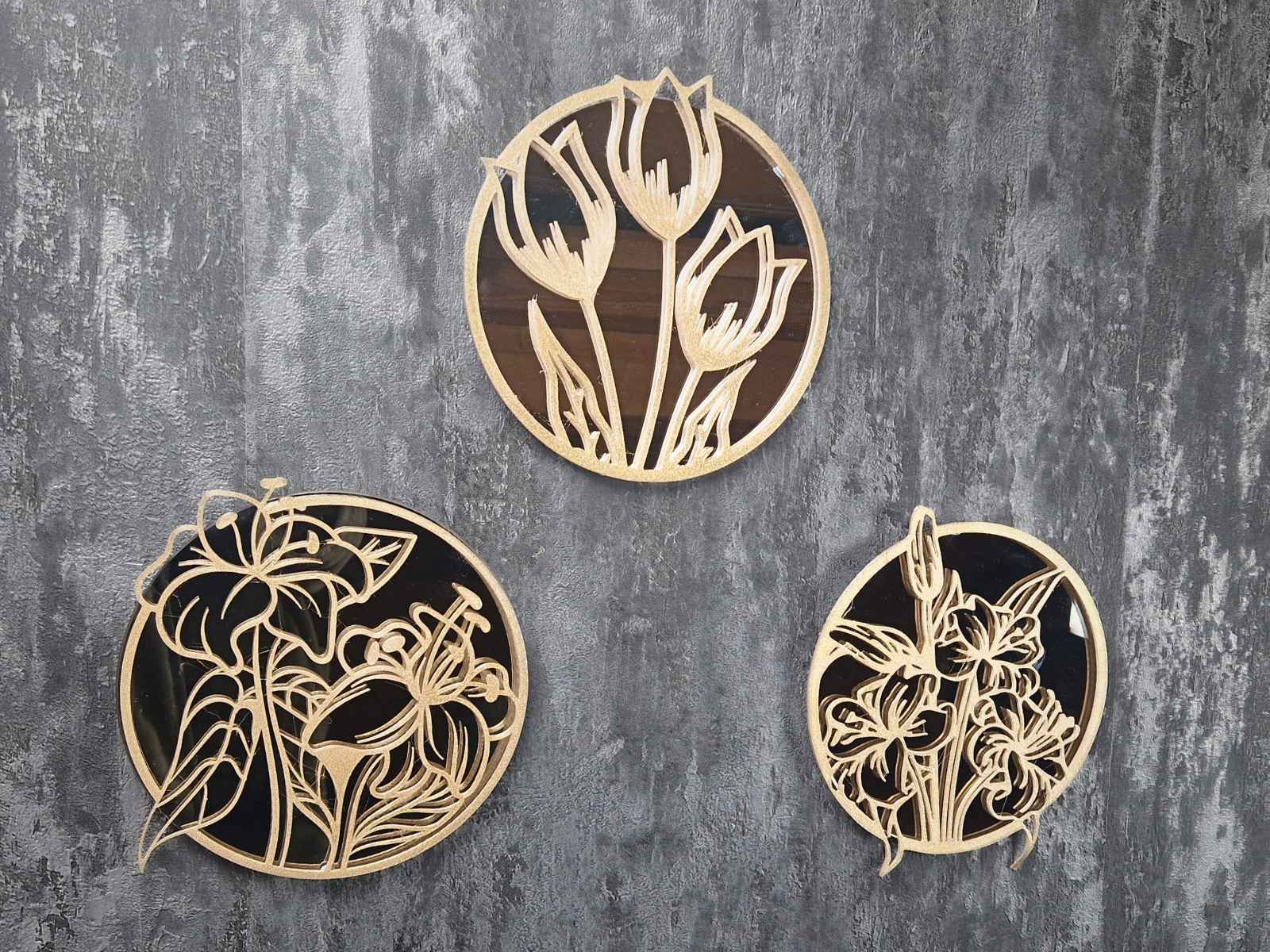 Gold floral round concrete mirror in a garden setting — handmade by Ripleys Nest