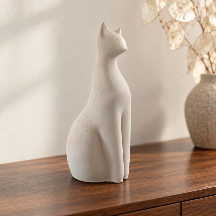 Pale modernist cat urn, sculptural front.