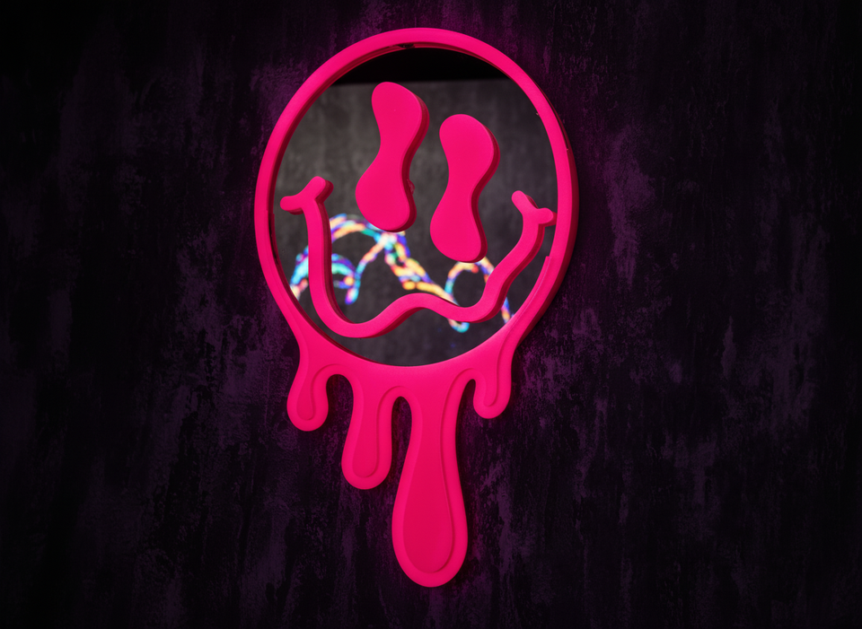 Neon pink melting face mirror with fairy light reflections
