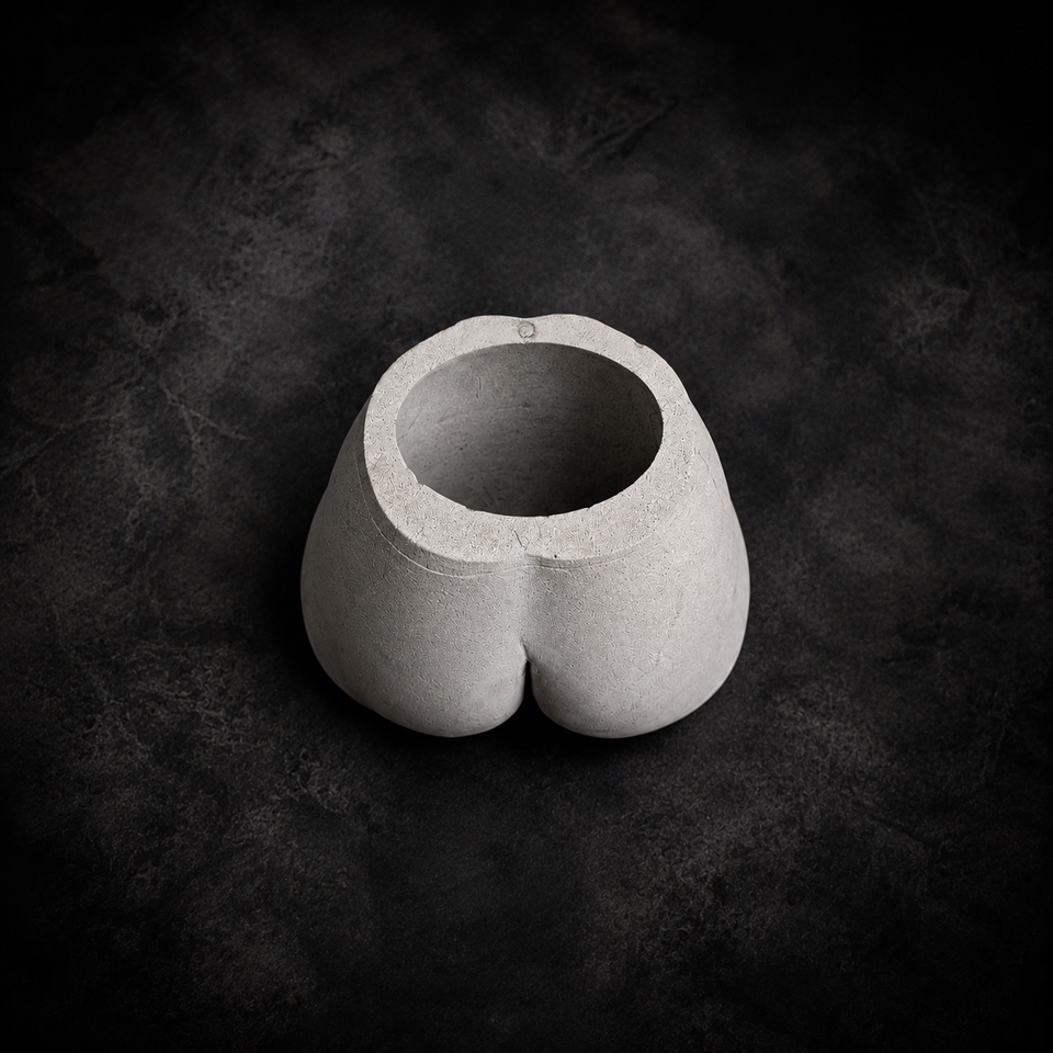 Top view of Cheeky Bum cast stone planter showing 12 cm opening