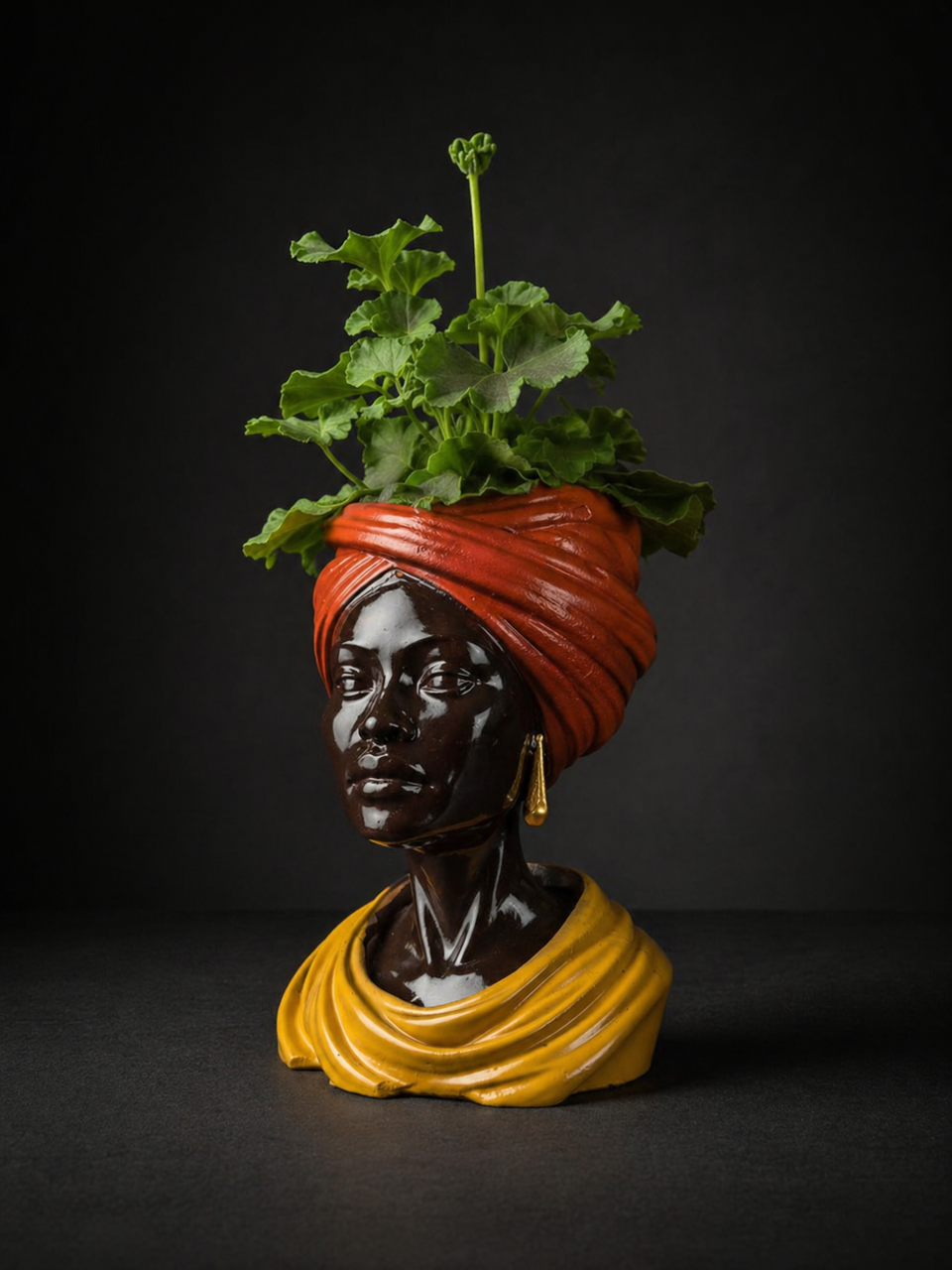 Golden Hour head planter with green plant at three quarter angle