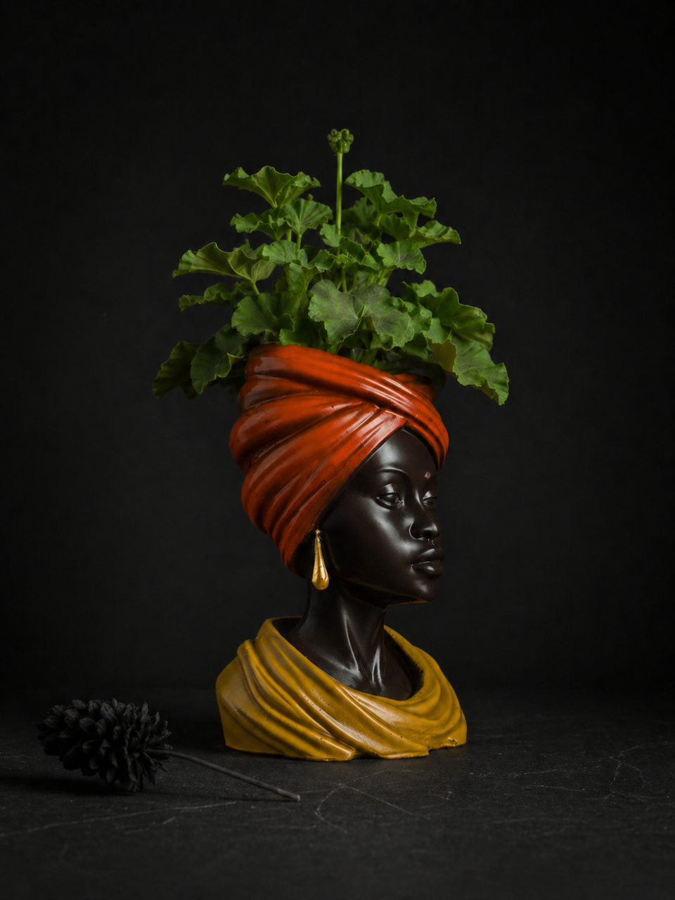Golden Hour indoor planter styled with plant on dark background