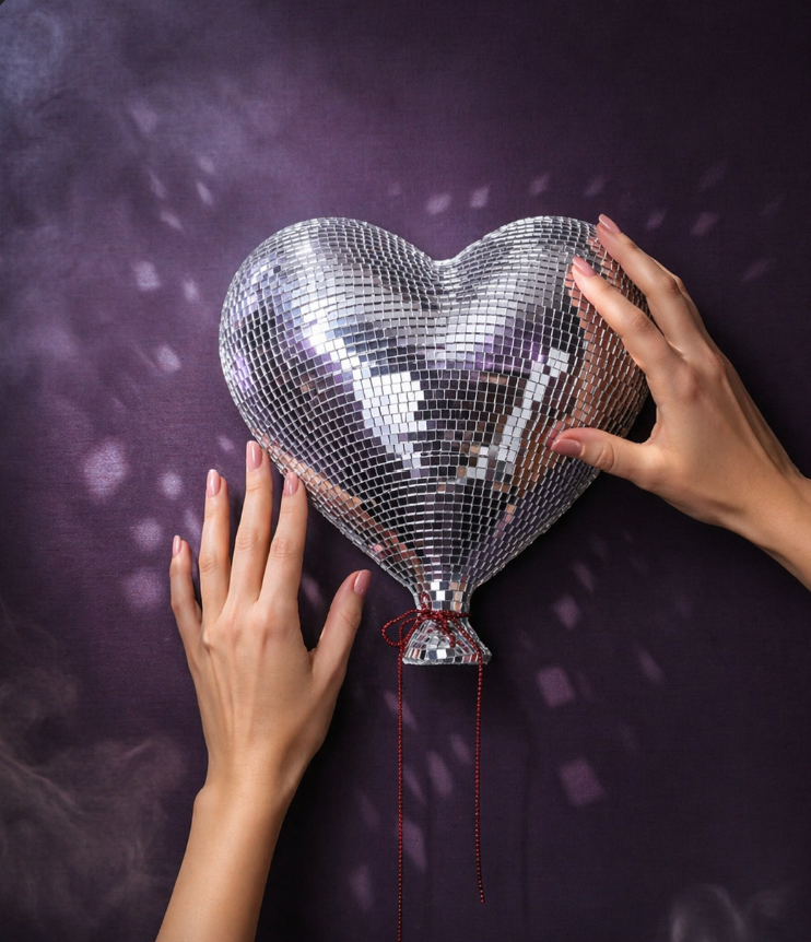 Heartthrob mirror ball heart wall art hands scale image