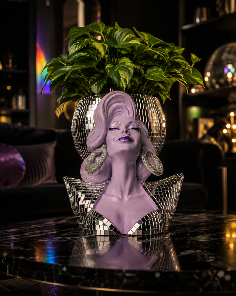 Mother Mirrorball drag queen planter styled in a moody room setting