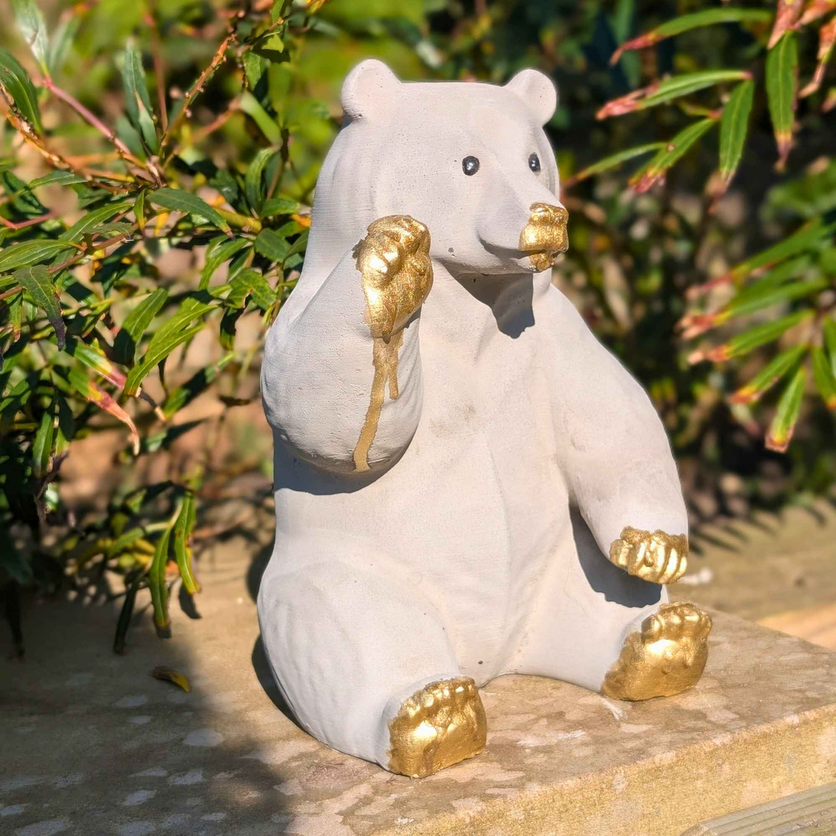 Honey-Dipped Golden Paw Bear Sculpture three-quarter angle view