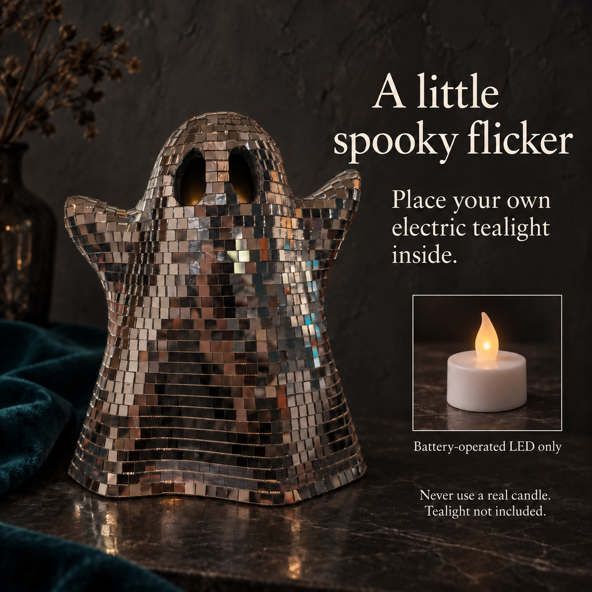 Mirror ghost with a faint warm tint through the eyes from an electric tealight inside, plus a separate example inset of a battery-operated LED tealight; accessory not included.
