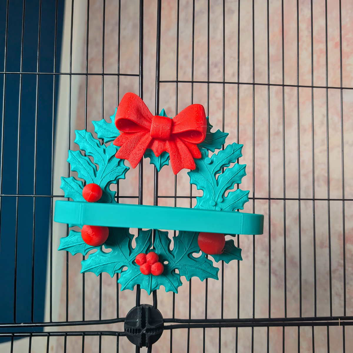 Turquoise Christmas wreath rat shelf showing its mounting form