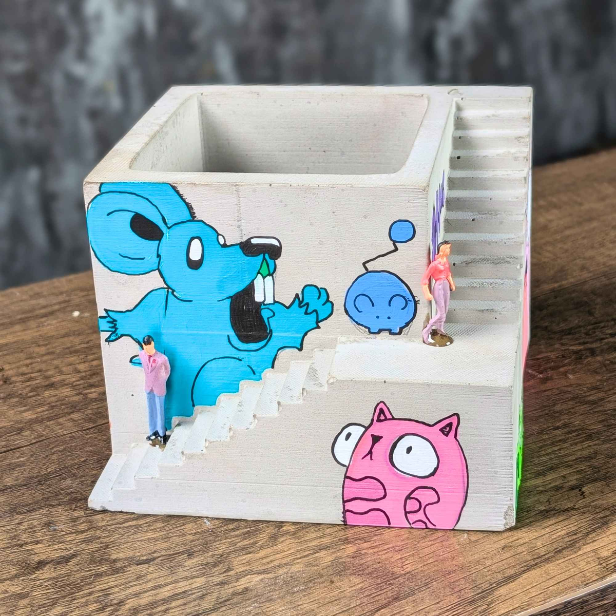 Custom Graffiti Building Planter complementary styling arrangement