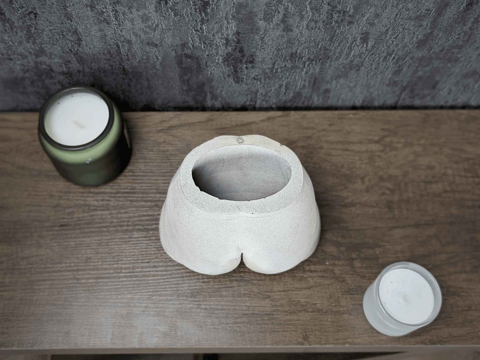 Cheeky Bum Cast Stone Planter — close-up — hand-cast concrete craftsmanship