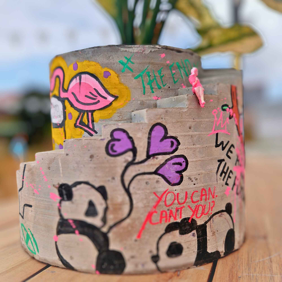 Statement Graffiti Planter - Unique Home Decor for Urban Aesthetics lifestyle context shot