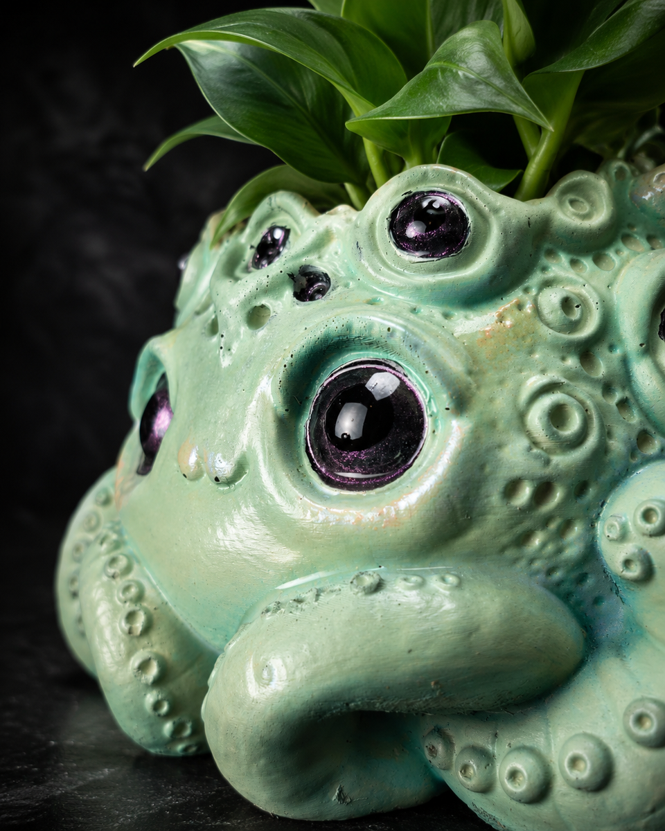 Close-up of Noodle many eyed tentacle planter with purple eye detail