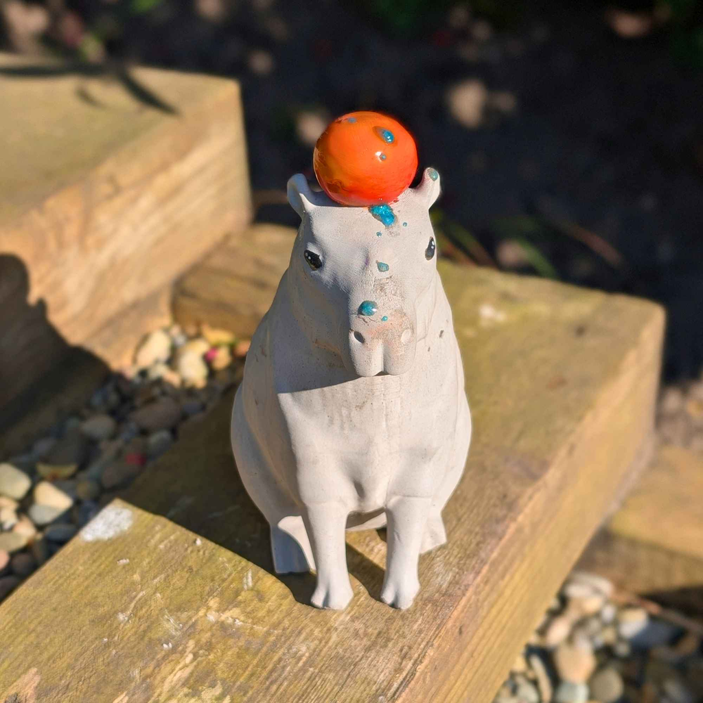 Capybara with Orange Concrete Sculpture