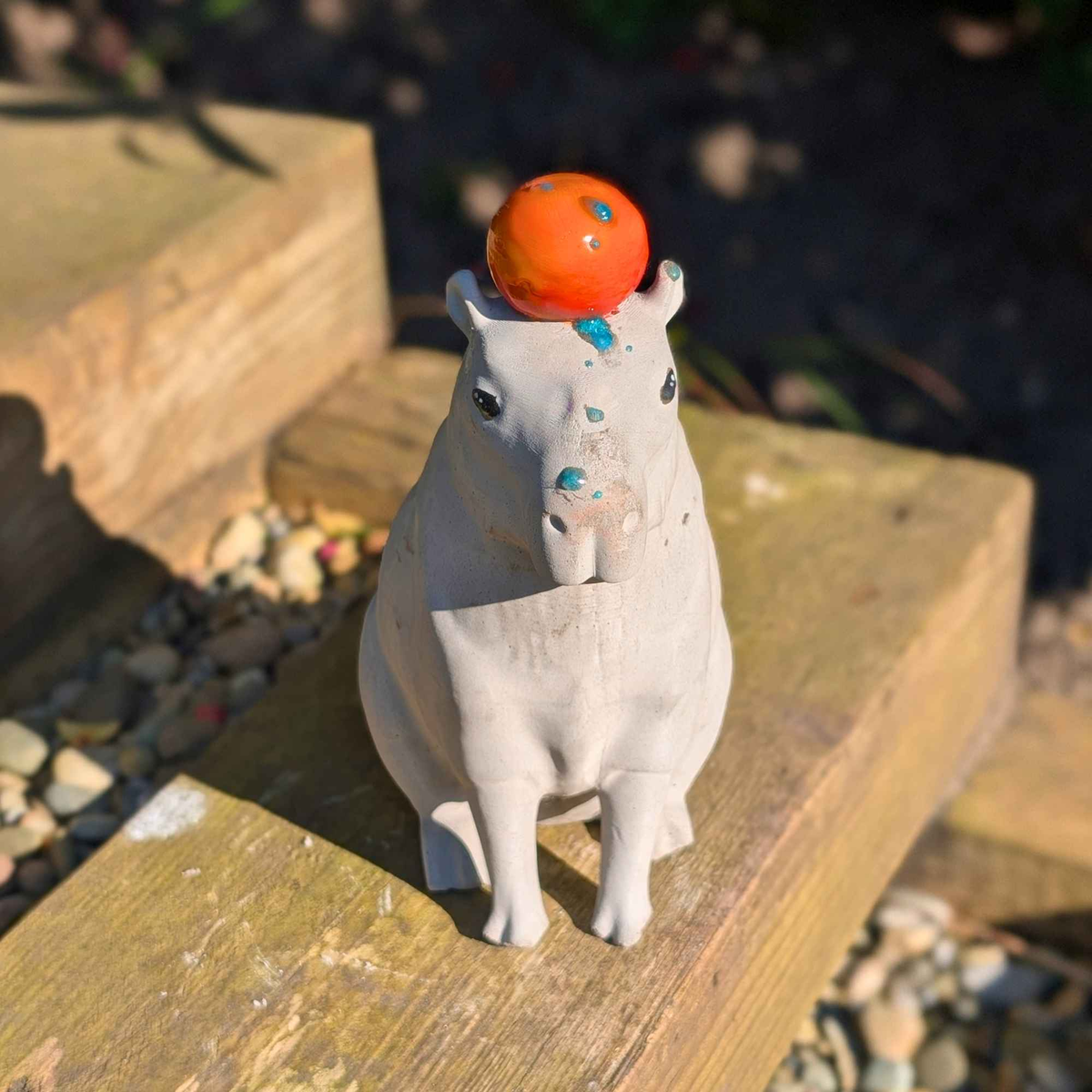 Capybara with Orange Concrete Sculpture in-use demonstration