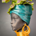 African Woman Head Planter styled in home setting