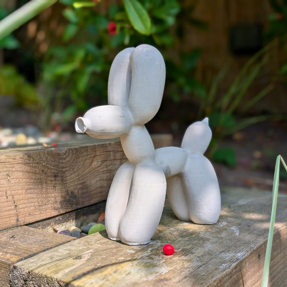 Balloon Dog Sculpture displayed alongside complementary pieces