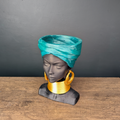 African Woman Head Planter displayed alongside complementary pieces