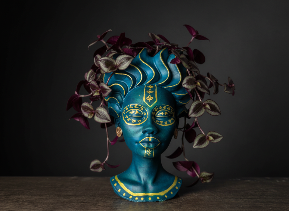 Cast stone teal face plant pot detail