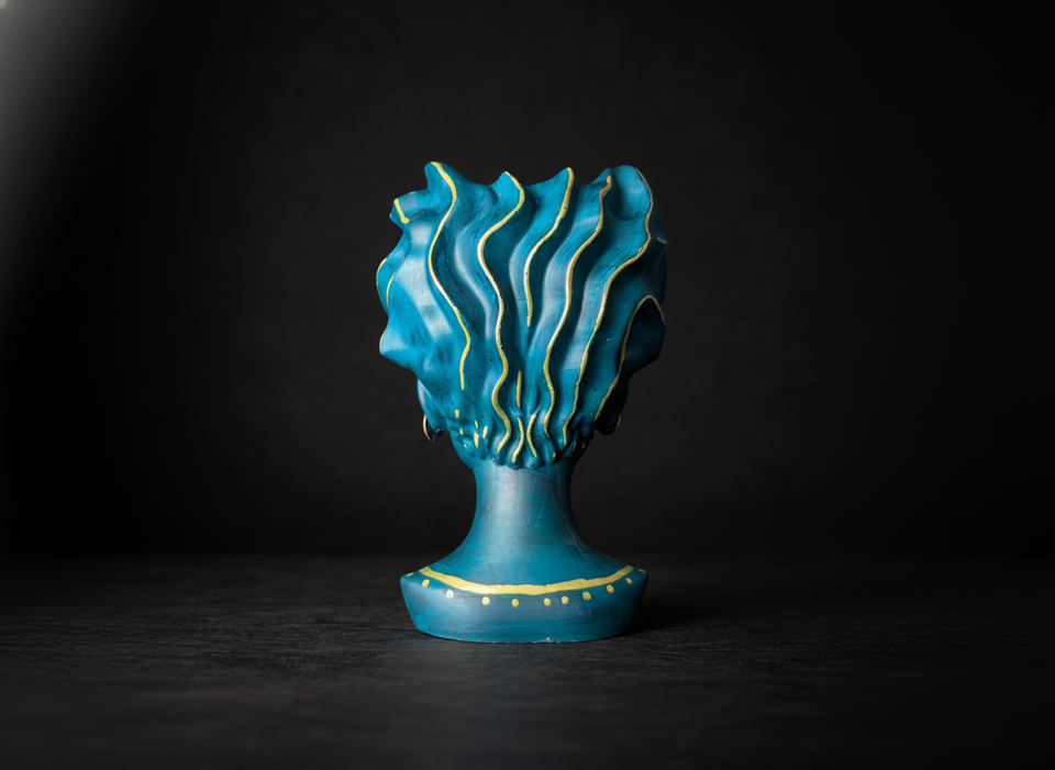 Teal wave crown head planter close up