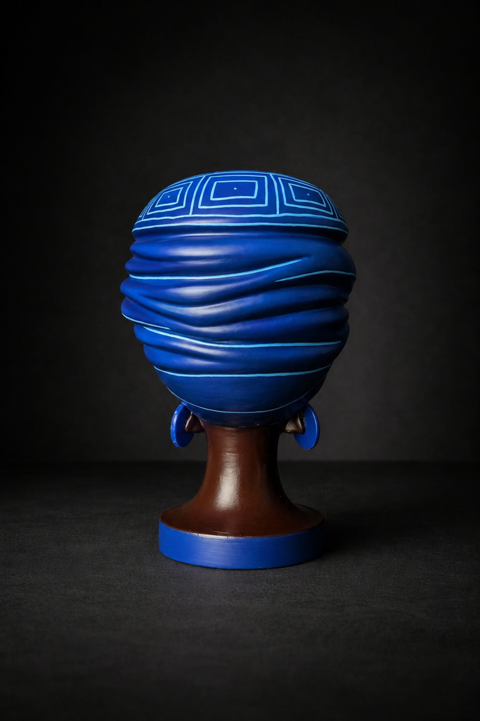 Adire Night cast stone head planter by Ripleys Nest