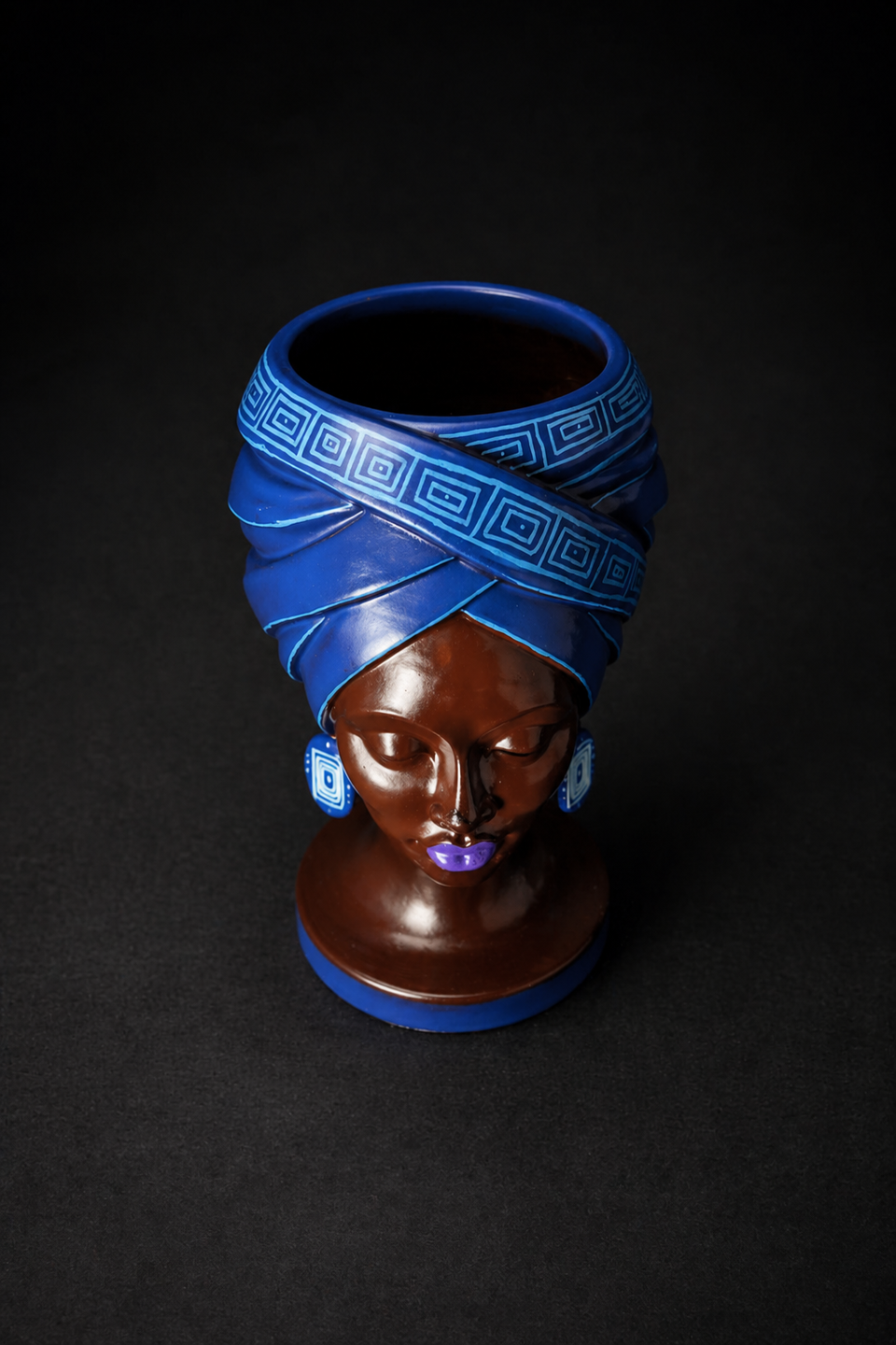 Adire Night cast stone head planter by Ripleys Nest