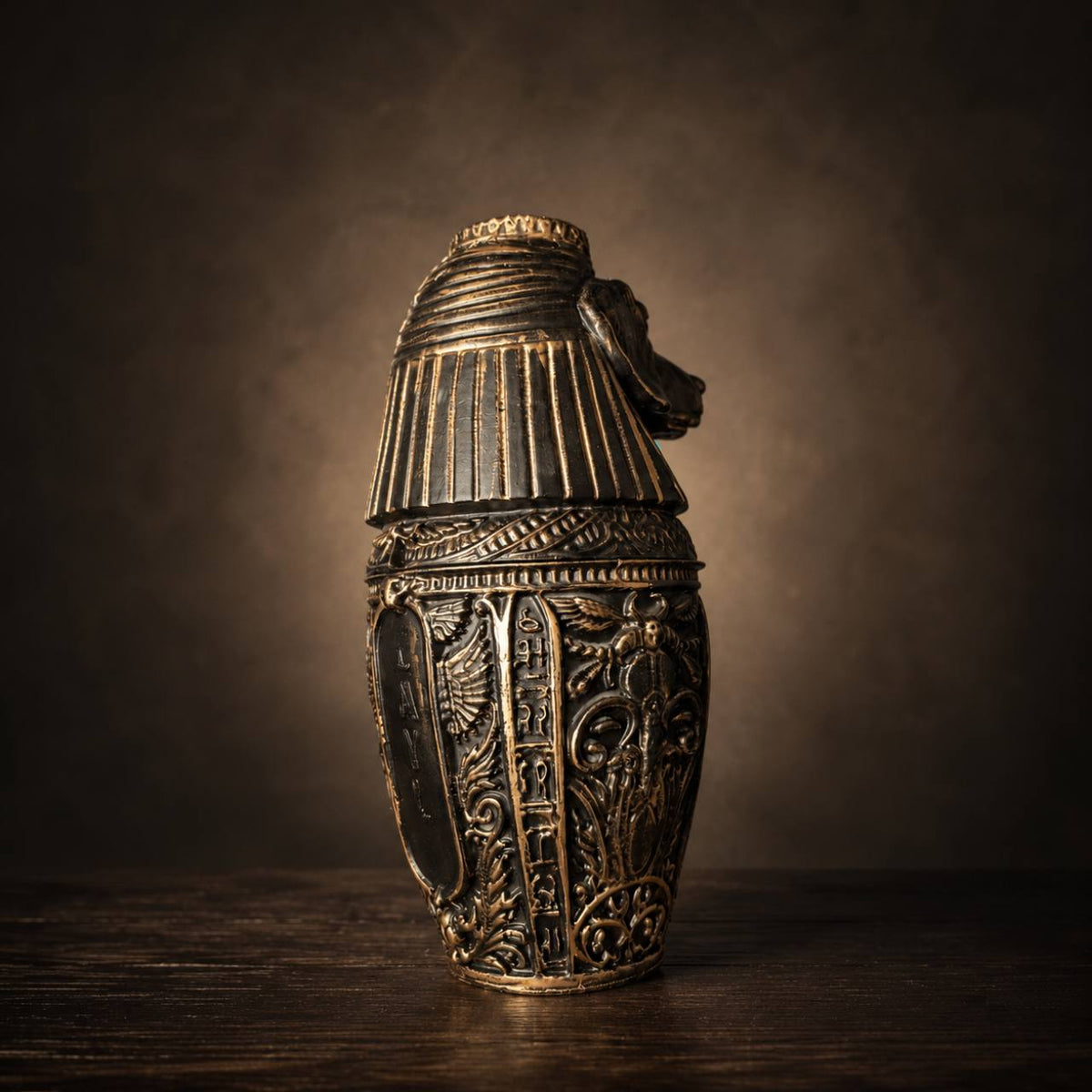 Back view of detailed cast stone canopic jar pet urn