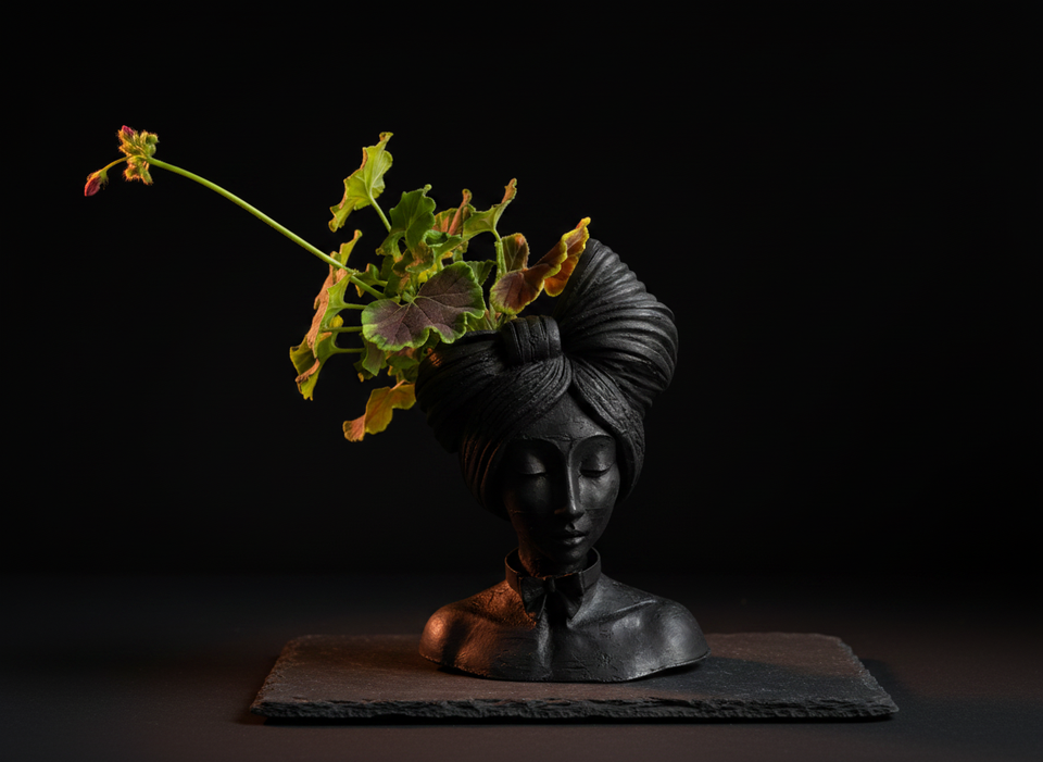 Sable woman planter dramatic studio shot