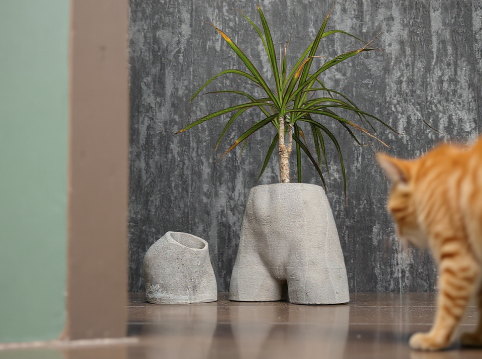 Cheeky Bum Cast Stone Planter — lifestyle — styled home setting