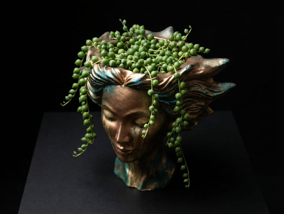 Golden Tears bust planter with trailing plant
