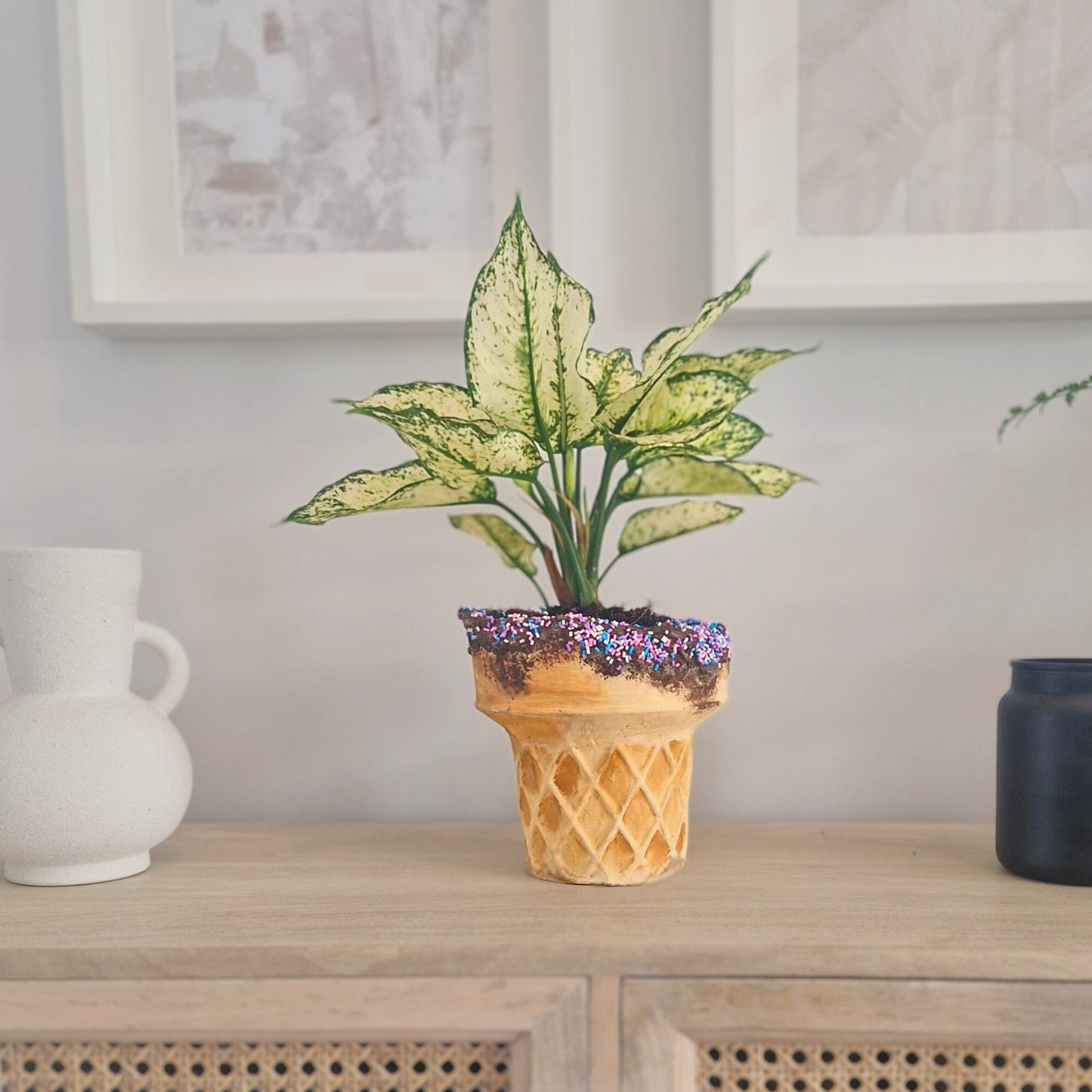 a vase of flowers sitting on a table 