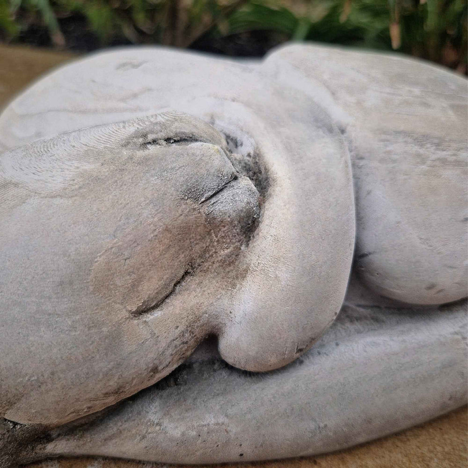 Sleeping Cat Garden Statue styled in home setting