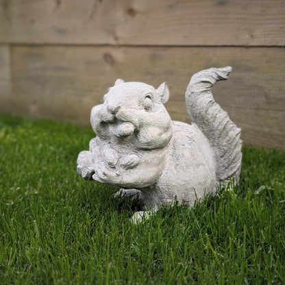 a group of white sheep sitting in a field 