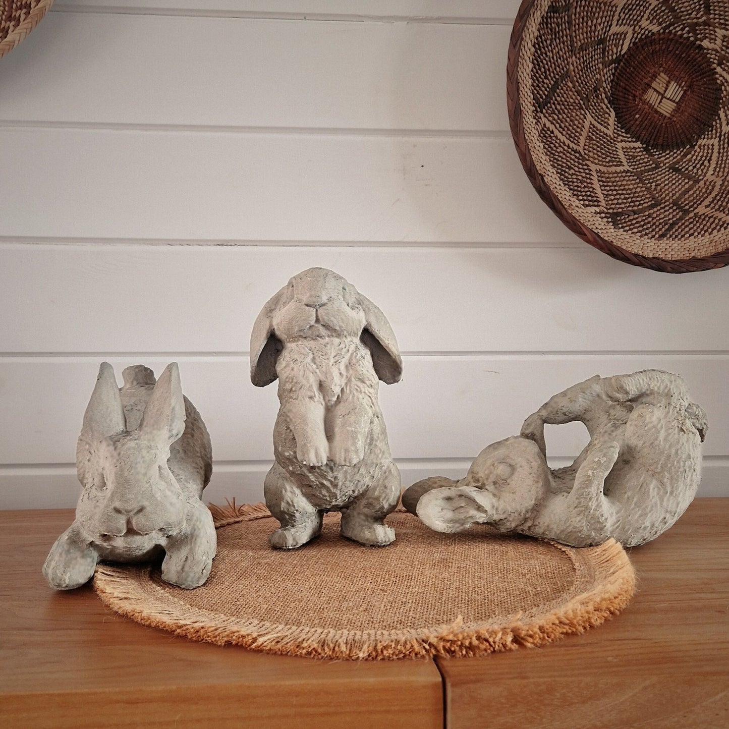 a group of teddy bears sitting on a table 