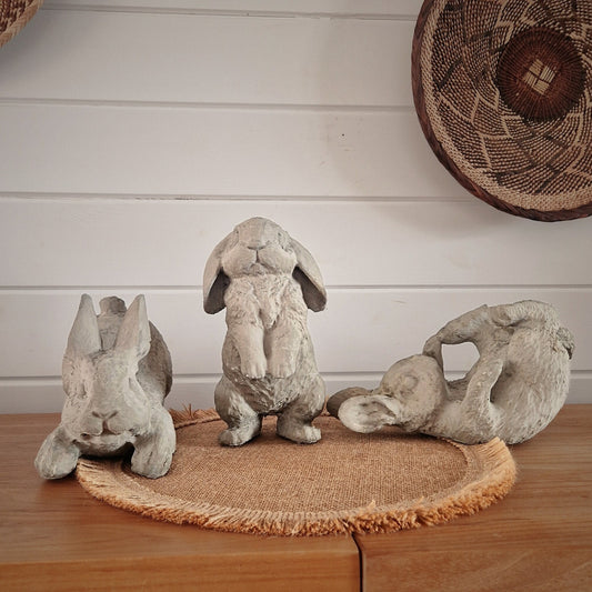 a group of teddy bears sitting on a table 