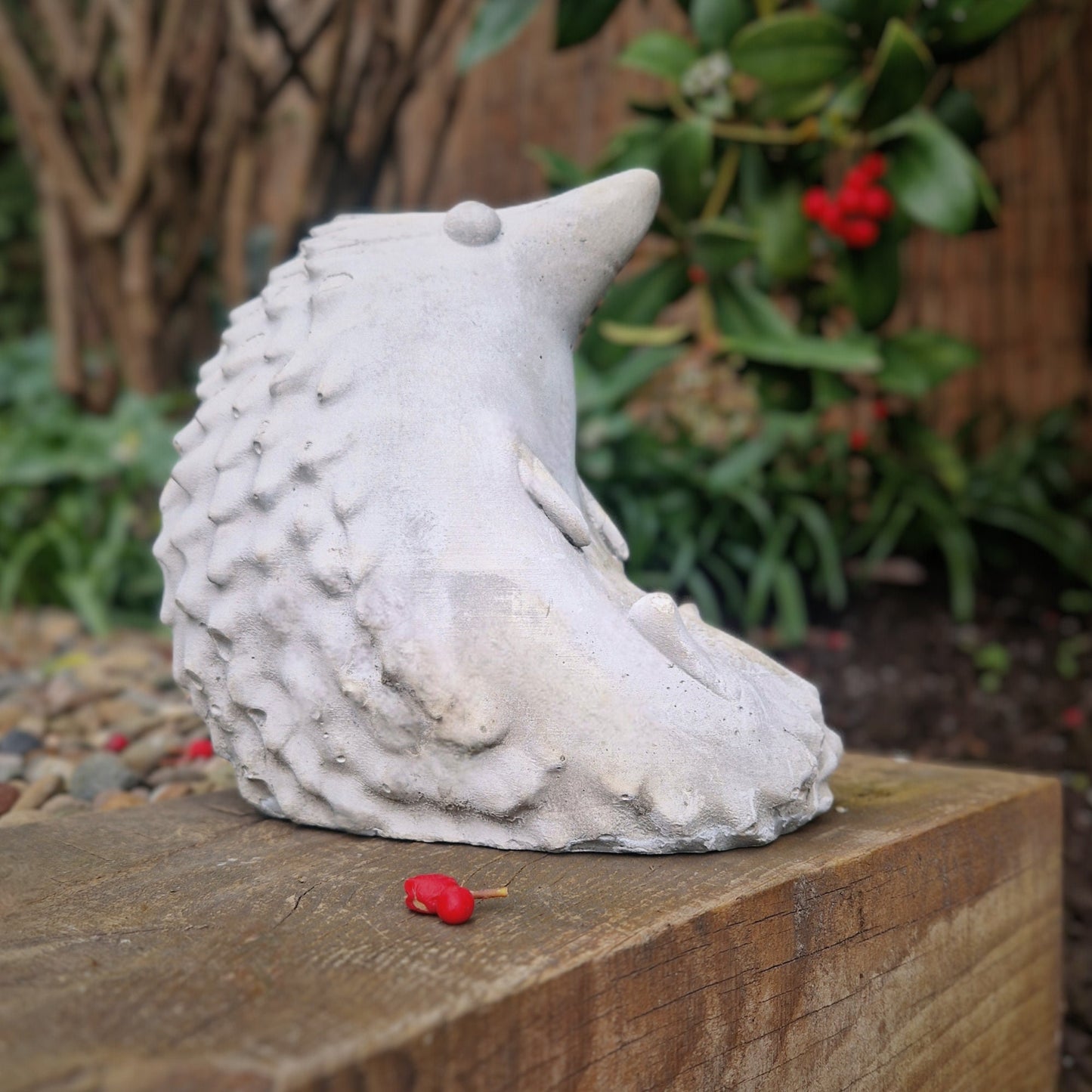 a white bird sitting on top of a box 