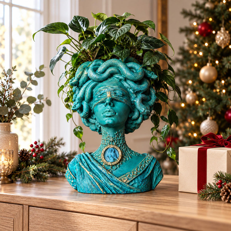 Medusa Still Standing blindfolded cast stone Medusa plant pot with trailing green houseplant