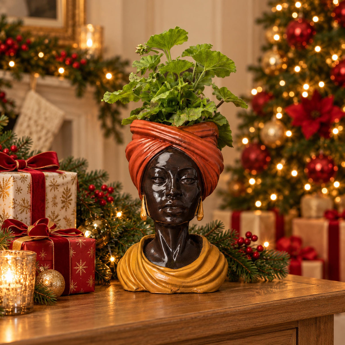 Golden Hour cast stone head planter with green plant on moody black background