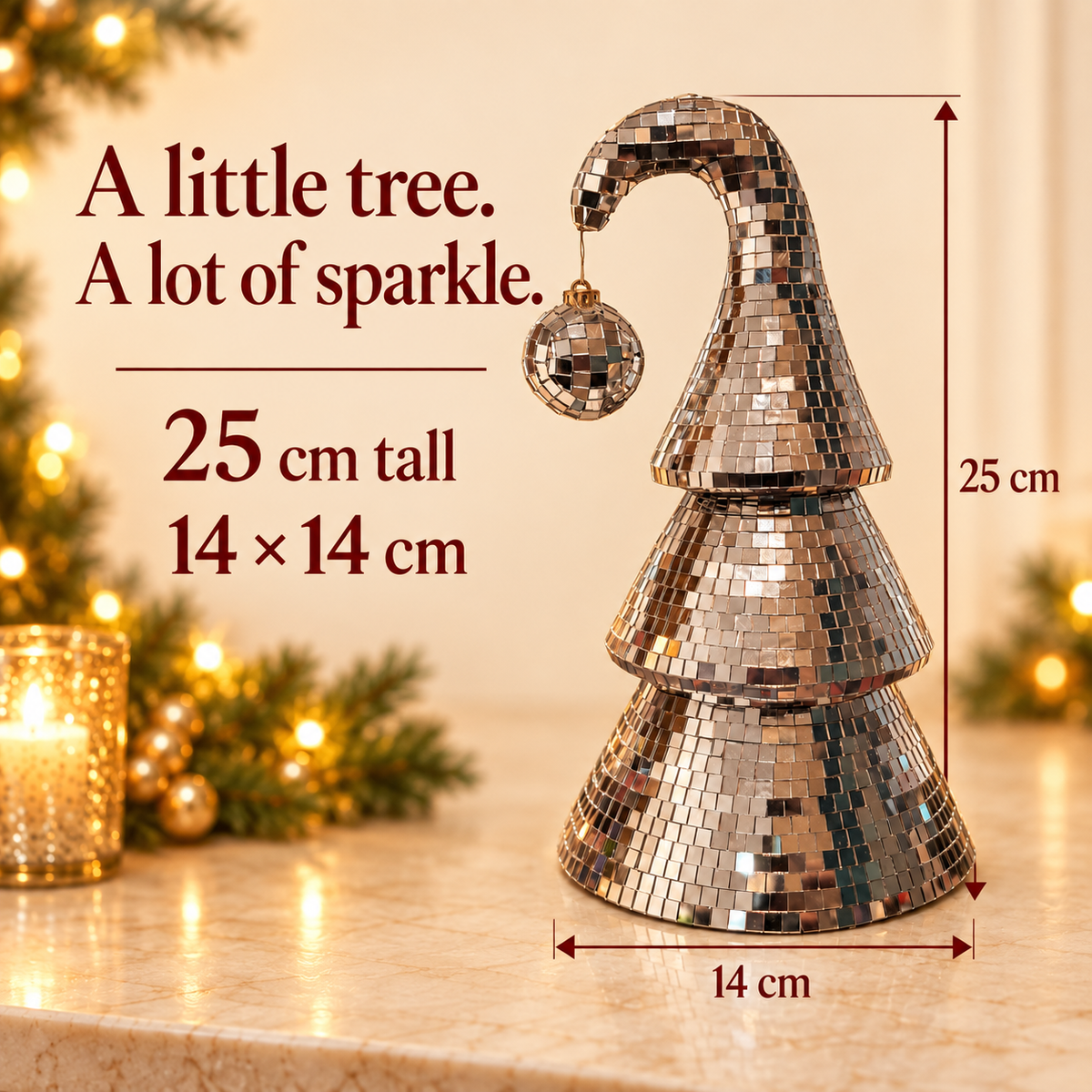 Dimensions · 25 × 14 × 14 cm of a silver mirror-ball Christmas tree with real glass tiles