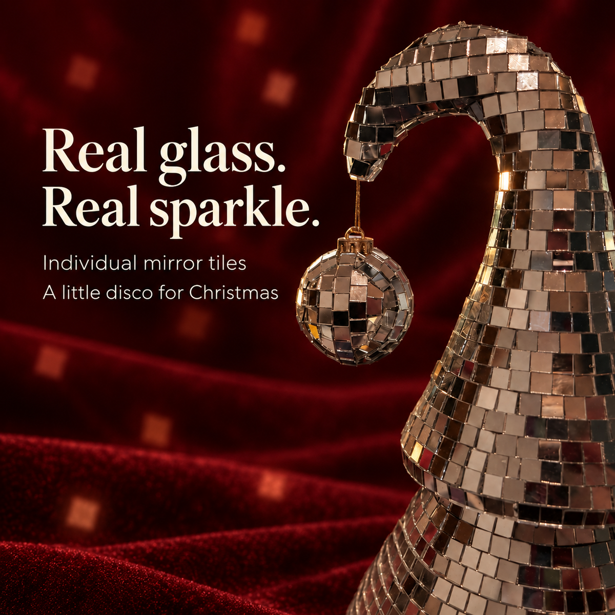 Real glass mirror tiles of a silver mirror-ball Christmas tree with real glass tiles