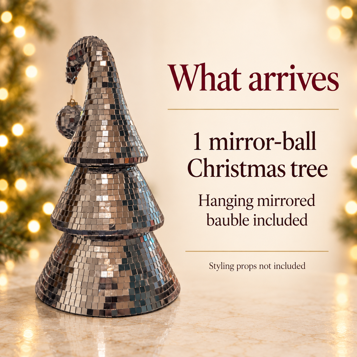 What arrives of a silver mirror-ball Christmas tree with real glass tiles