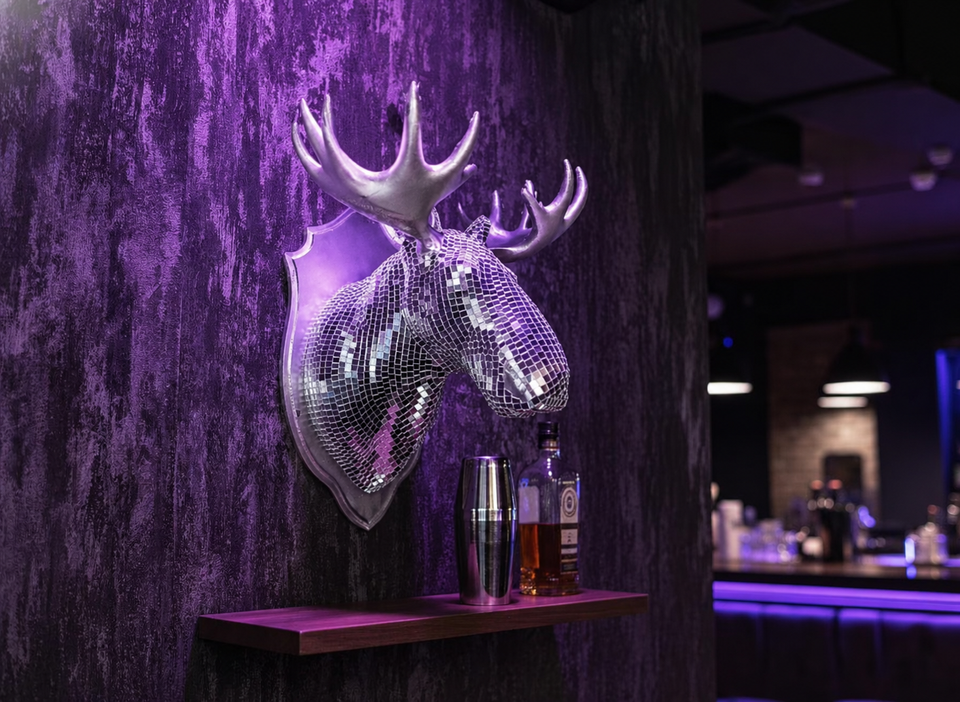 Mirrorball Moose wall sculpture above bar shelf in purple moody room