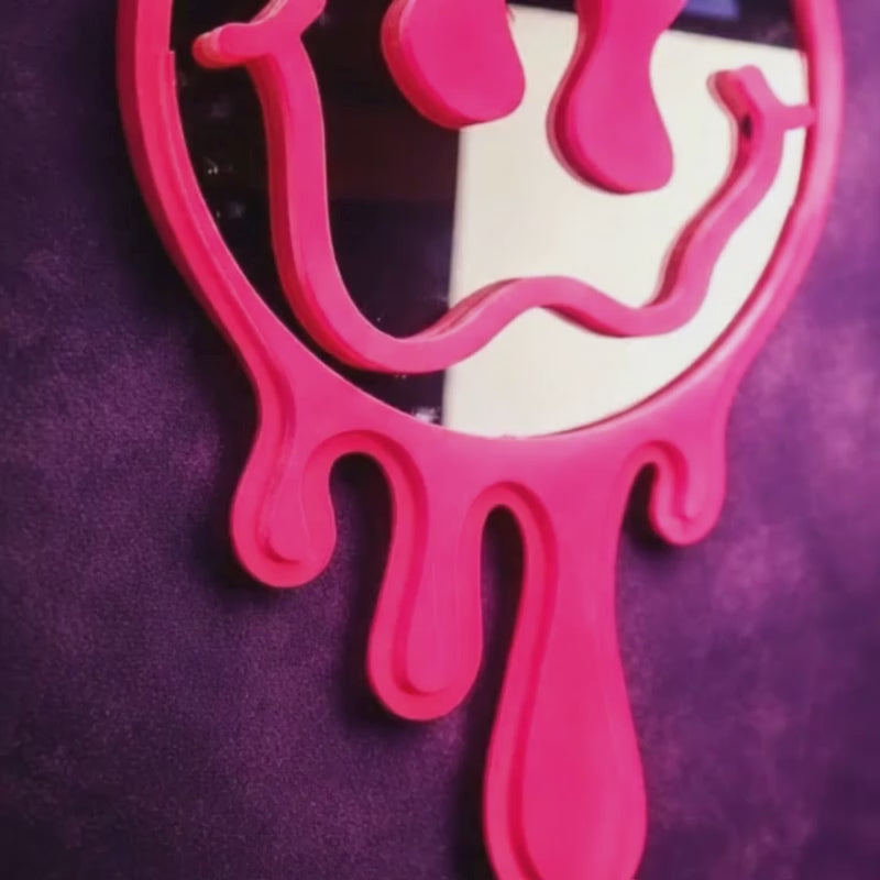 The Meltdown neon drip melting face mirror product video