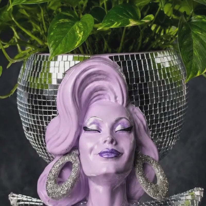 Video of Mother Mirrorball mirrorball drag queen planter in a dark product setting