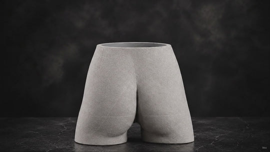 Cheeky Bum cast stone planter shown from multiple angles