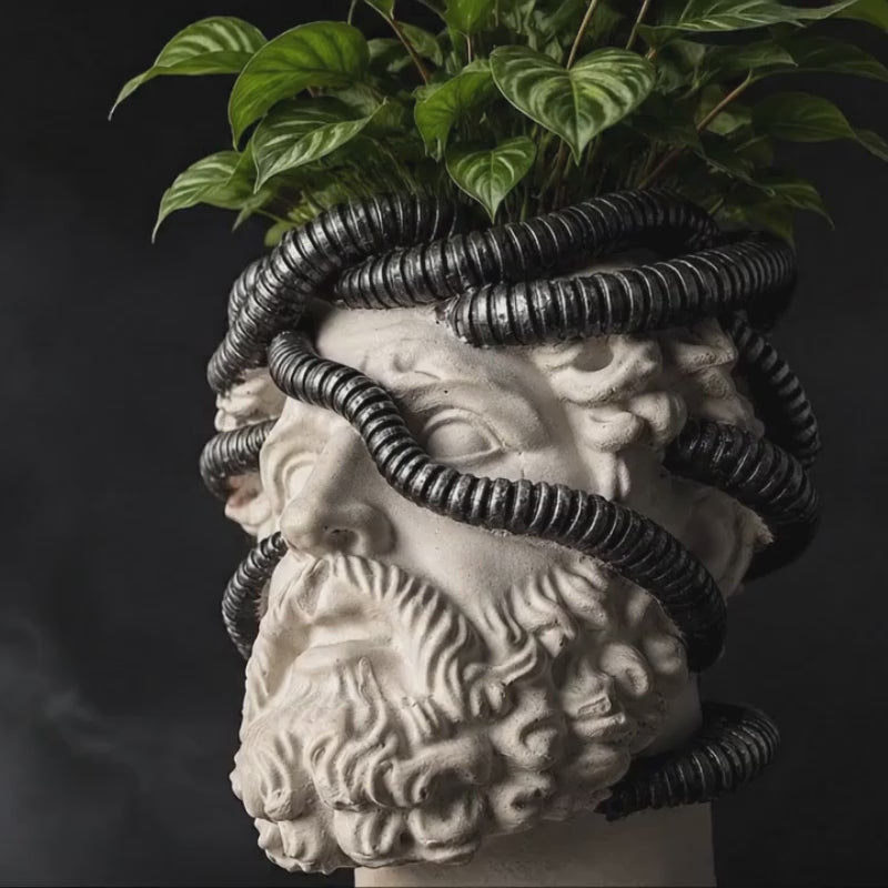 Video of Aristotle.exe classical biotech planter in a dark product setting