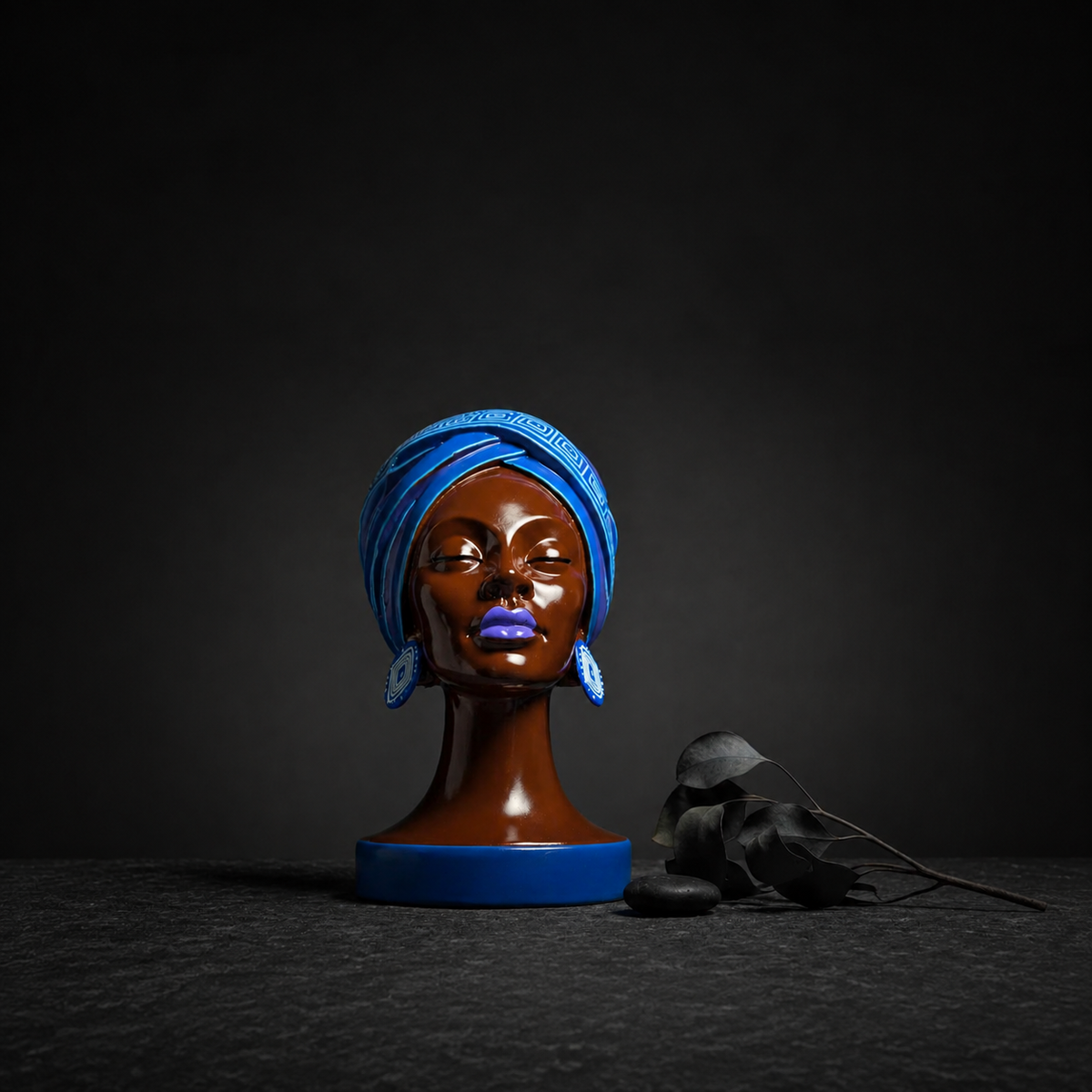 Adire Night black and gold head planter studio view