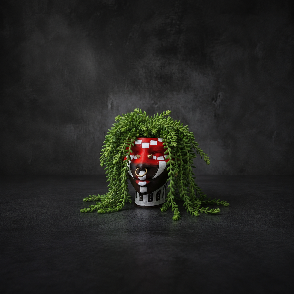 Ashanti Warrior Head Planter - Red with burros tail plant