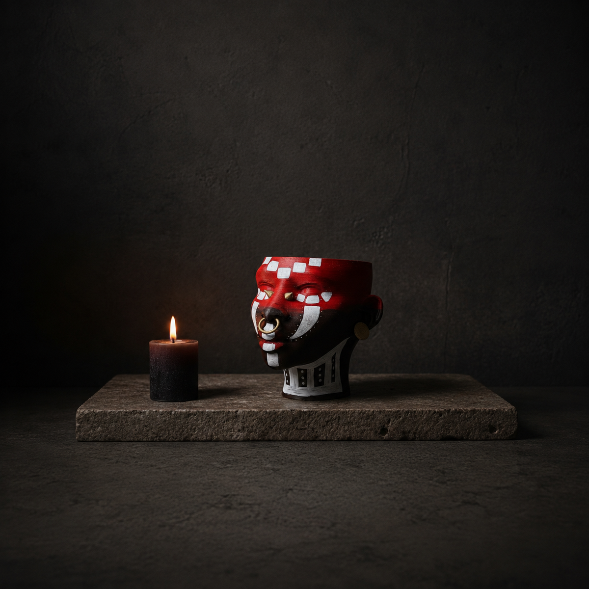 Ashanti Warrior Head Planter - Red on stone with candle